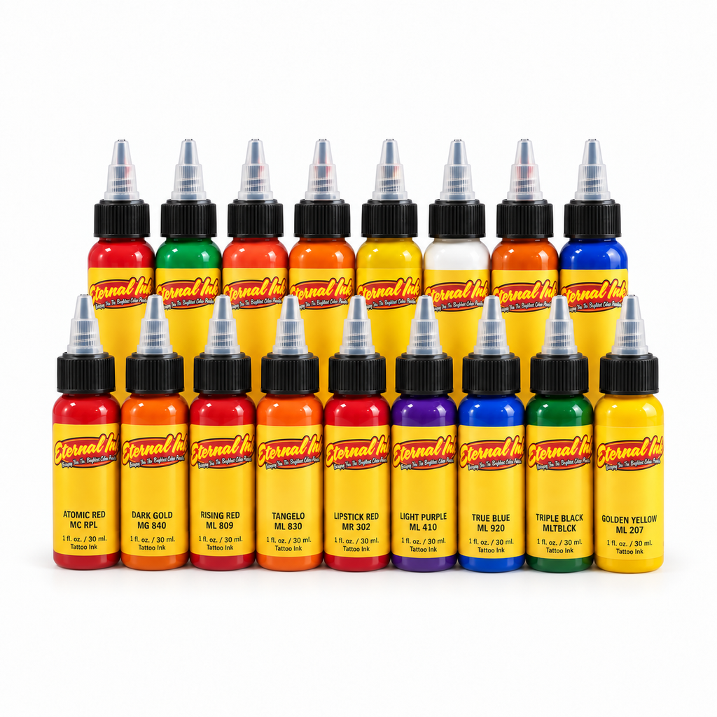 Color tattoo ink bottles arranged on a white background